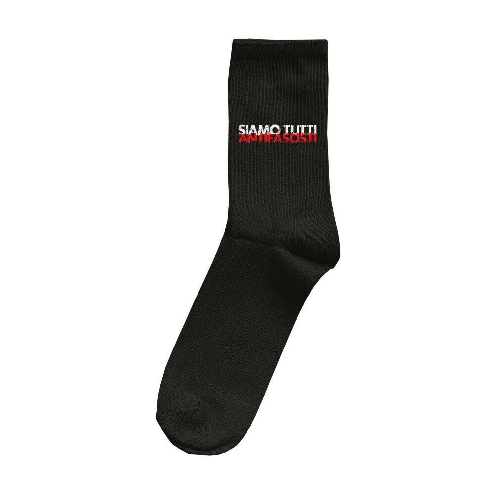 „Schwarze Socke mit gesticktem Schriftzug ‚SIAMO TUTTI ANTIFASCISTI‘ in Weiß und Rot – klares antifaschistisches Statement aus dem FCK NZS Shop